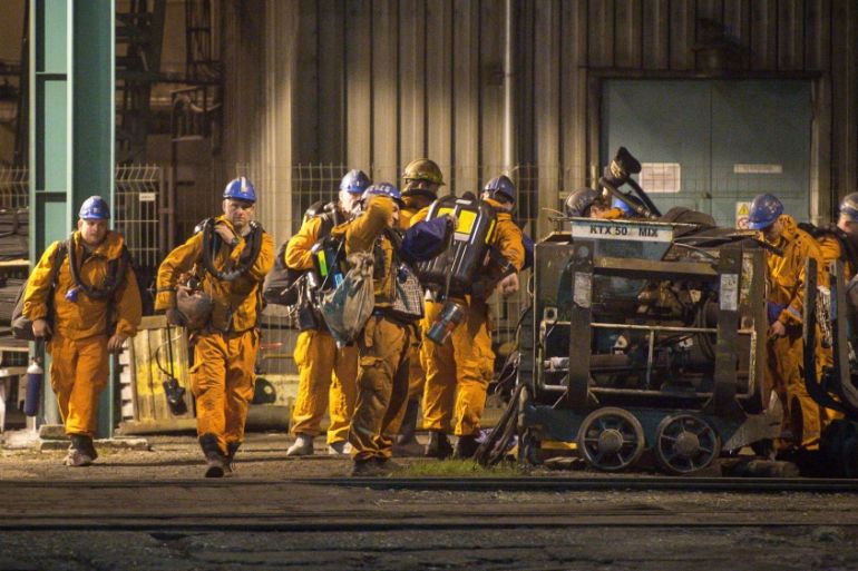 Rescue personnel prepare to search for missing miners after a methane explosion at the CSM hard coal mine in Karvina