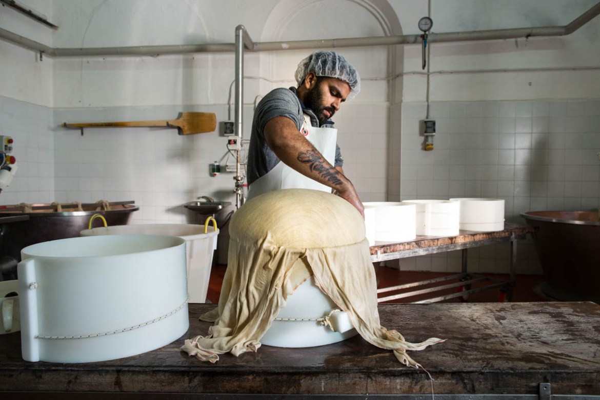 The cheese makers say the job requires great patience as well as a willingness to work long hours. [Erik Messori/CAPTA/Al Jazeera]