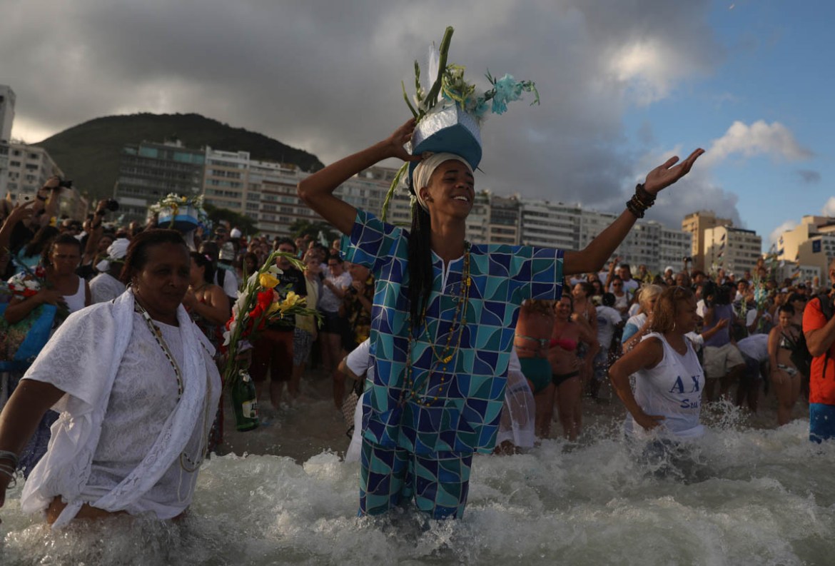 Believers of Afro-Brazilian religions pay tribute to Yemanja, goddess of the sea, during a traditional celebration ahead of New Year''s eve on Copacabana Beach in Rio de Janeiro, Brazil December 29, 2
