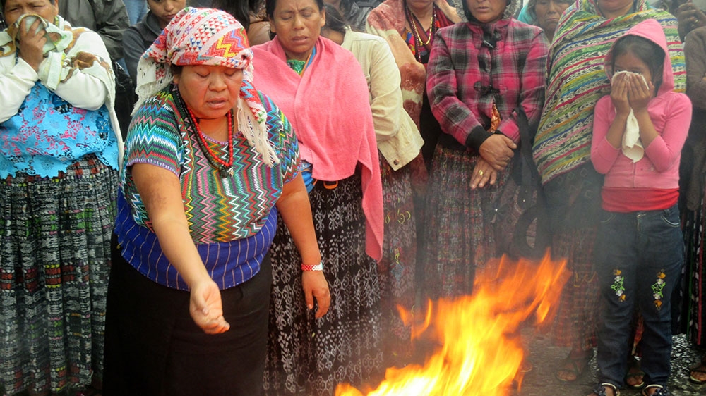 Guatemalans hold a ceremony to commemorate the 39th anniversary of the January 31, 1980 Spanish Embassy massacre in which dozens of people were burned to death [Sandra Cuffe/Al Jazeera]