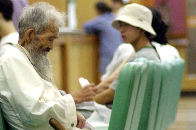 A patient waits for medical treatment at Seoul National University Hospital Friday, Aug 11, 2000.
