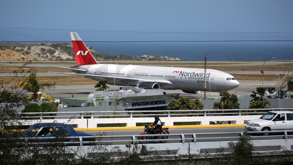 A plane from Russian company Nordwind is seen at Simon Bolivar Airport in Caracas [Andres Martinez/Reuters] 