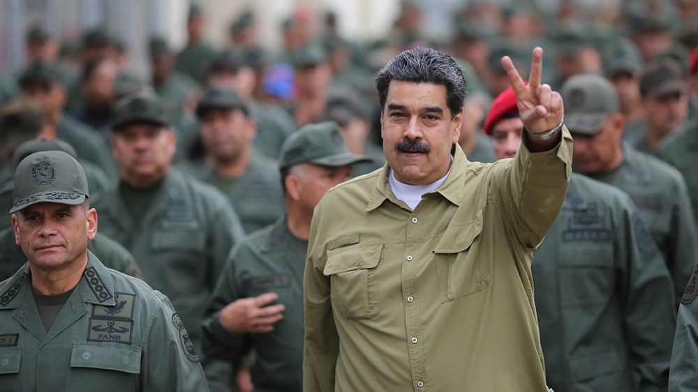 Venezuela's President Nicolas Maduro gestures during a meeting with soldiers at a military base in Caracas [Handout via Miraflores Palace/Reuters] 