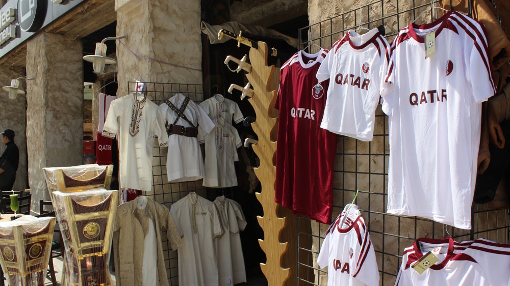 Qatar football shirts are in big demand before the final [Saba Aziz/Al Jazeera] 