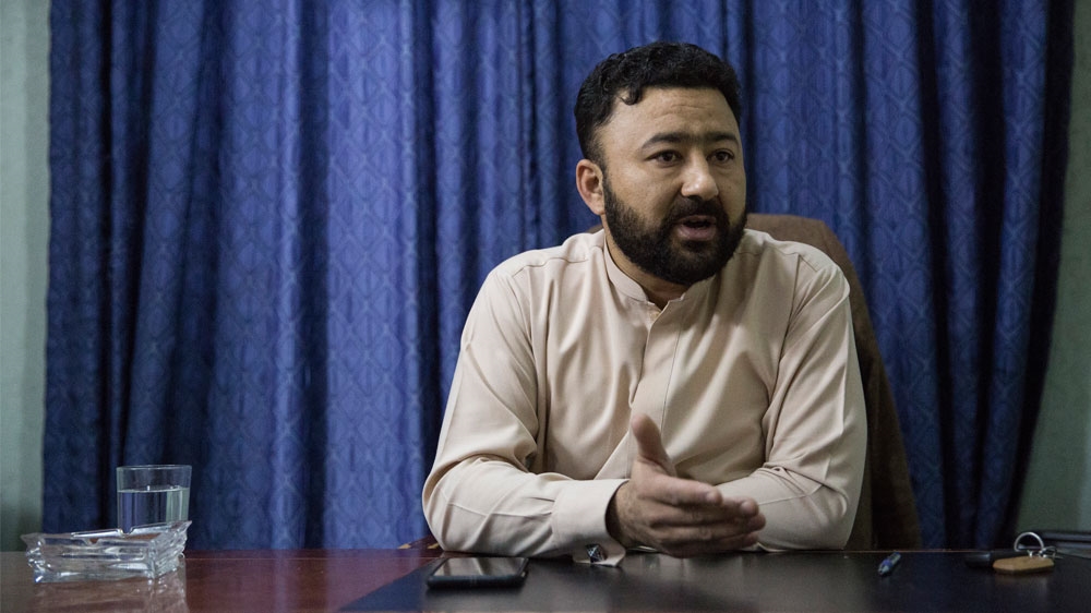 Muhammad Adil Obaid from the Uighur community runs his own business in the China Market in Rawalpindi, Pakistan [Saiyna Bashir/Al Jazeera]