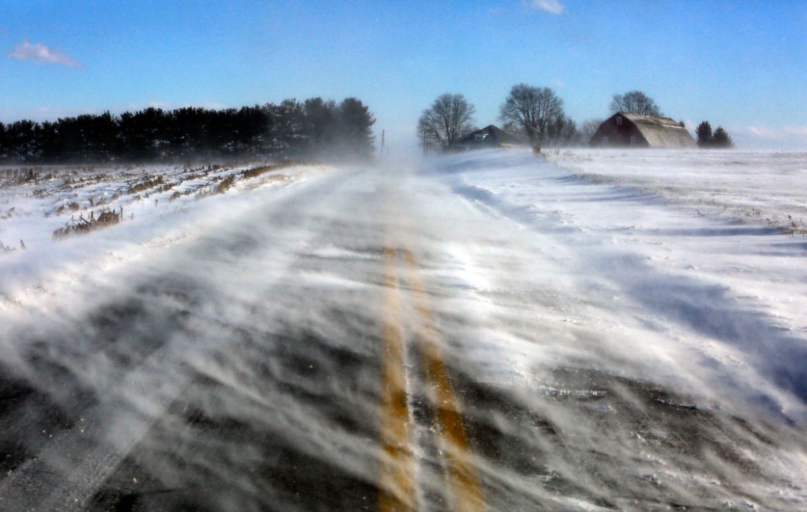 Drifting snow obscures a road near Mount Joy in Lancaster County, Pa., on Wednesday Jan. 30, 2019. A bitter deep freeze is moving into the Northeast from the Midwest, sending temperatures plummeting a