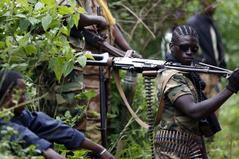 Seleka fighter holds his machine gun near the town of Kuango