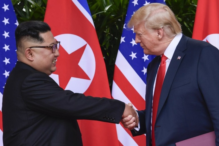 North Korea leader Kim Jong Un and U.S. President Donald Trump shake hands