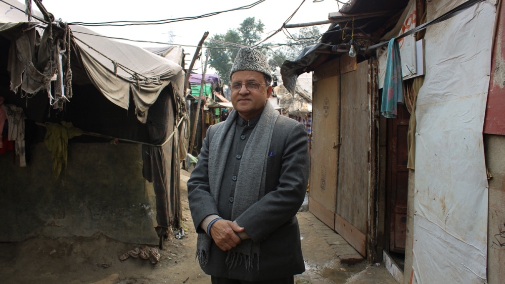 Zafar Mahmood of Zakat Foundation at the Kalindi Kunj camp in New Delhi [Bilal Kuchay/Al Jazeera]