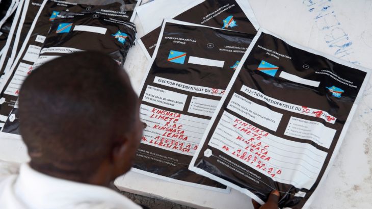 A man re classifies voting materials at Congo''s Independent National Electoral Commission (CENI) tallying centre in Kinshasa, Democratic Republic of Congo, January 3, 2019.