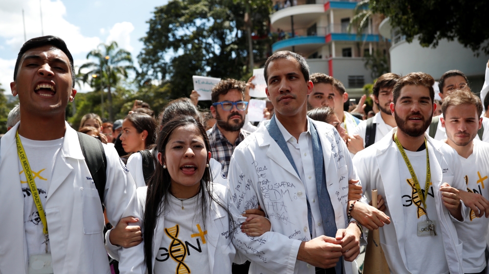 Venezuelan opposition leader Juan Guaido takes part in a demonstration [Carlos Garcia/Reuters]