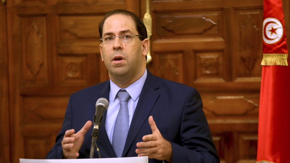 Chahed is leading a crackdown on corruption with international backing [Hassene Dridi/AP]