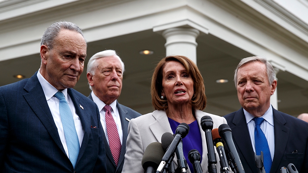 Pelosi speaks to reporters after meeting with Trump about border security in the Situation Room of the White House [Evan Vucci/AP Photo]