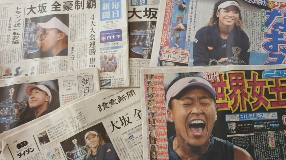 Front pages of Japanese newspapers the morning after Naomi Osaka's Australian Open [Kiyomi Obo/Al Jazeera]