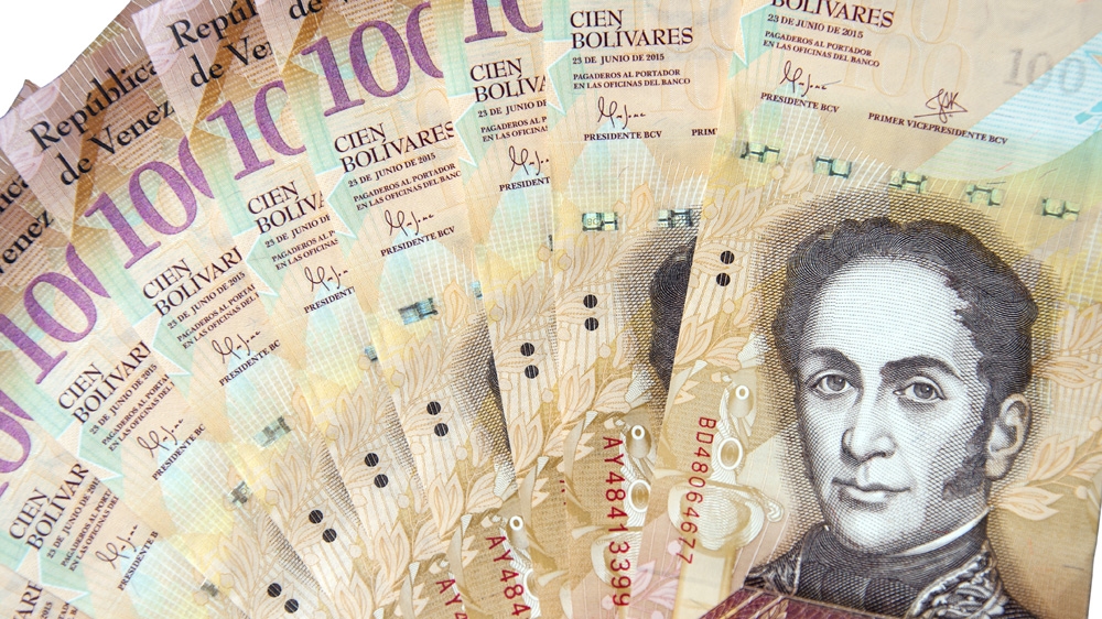 Venezuela's government has devalued its currency by almost 35 percent [File: Getty Images] 