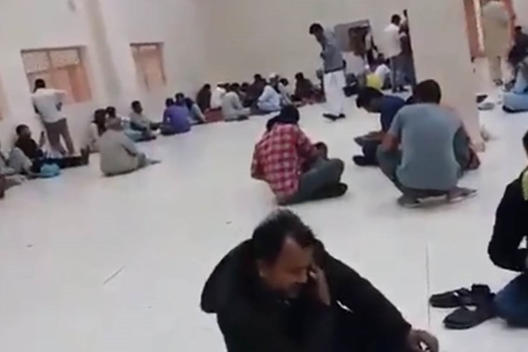 Scores of Rohingya Muslims sit on the floor of the Shumaisi detention centre in Jeddah, as Saudi authorities prepare to deport the men to Bangladesh [Nay San Lwin/Al Jazeera]Scores of Rohingya Muslims