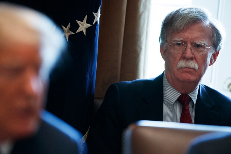 National Security Adviser John Bolton listens as President Donald Trump speaks during a cabinet meeting at the White House, Monday, April 9, 2018, in Washington. (AP Photo/Evan Vucci)