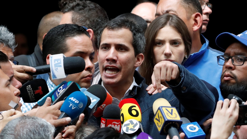Guaido called for a 'peaceful' strike on Wednesday [Carlos Garcia Rawlins/Reuters]