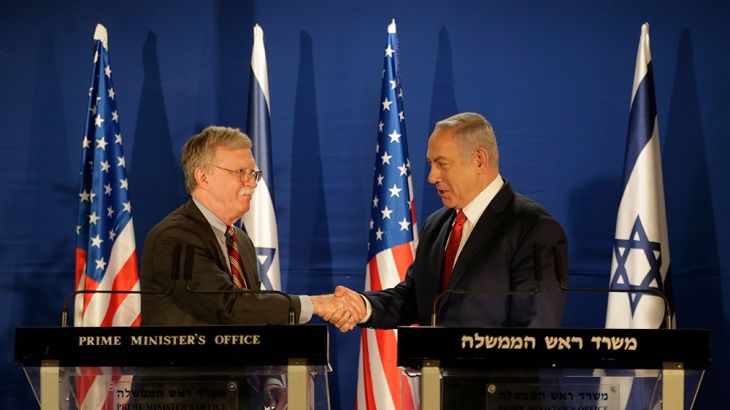 Israeli Prime Minister Benjamin Netanyahu, right, shakes hands with US National Security Advisor John Bolton, during a joint statement to the media follow their meeting, in Jerusalem, Sunday, Jan. 6