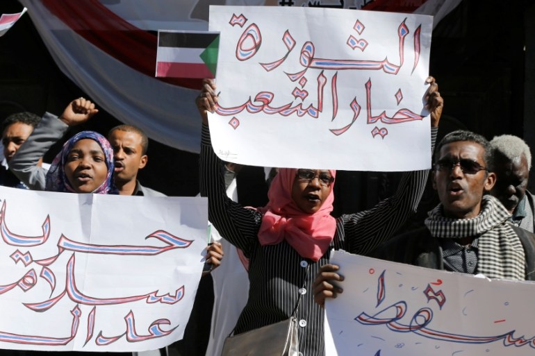 Sudanese protesters shout slogans against Sudan''s President Omar al-Bashir as they demonstrate outside the closed Sudanese embassy in Sanaa, Yemen