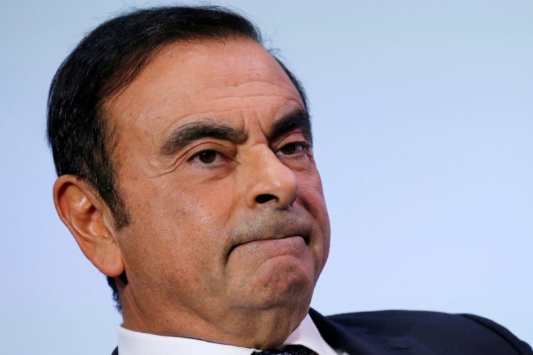 FILE PHOTO - Carlos Ghosn, Chairman and CEO of the Renault-Nissan-Mitsubishi Alliance, attends the Tomorrow In Motion event on the eve of press day at the Paris Auto Show