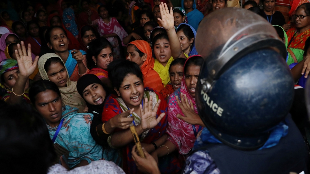 Bangladesh police and garment workers clash over wage rise ...