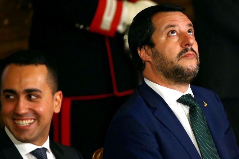 FILE PHOTO: Interior Minister Matteo Salvini looks on next to Italy''s Minister of Labour and Industry Luigi Di Maio at the Quirinal palace in RomeREUTERS/Tony Gentile//File Photo
