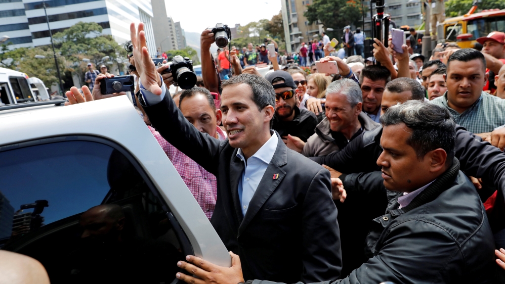Opposition leader Juan Guaido attends a protest of the public transport sector against the government [Manaure Quinter/Reuters]
