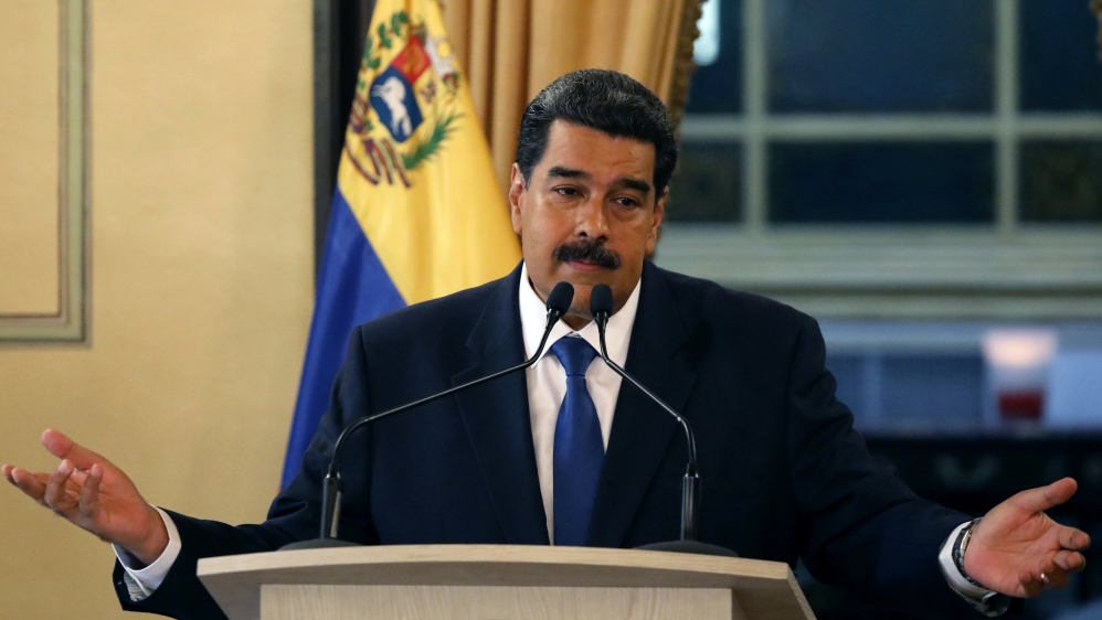 Venezuela's President Nicolas Maduro gestures during a news conference at Miraflores Palace [Andres Martinez Casares/Reuters]