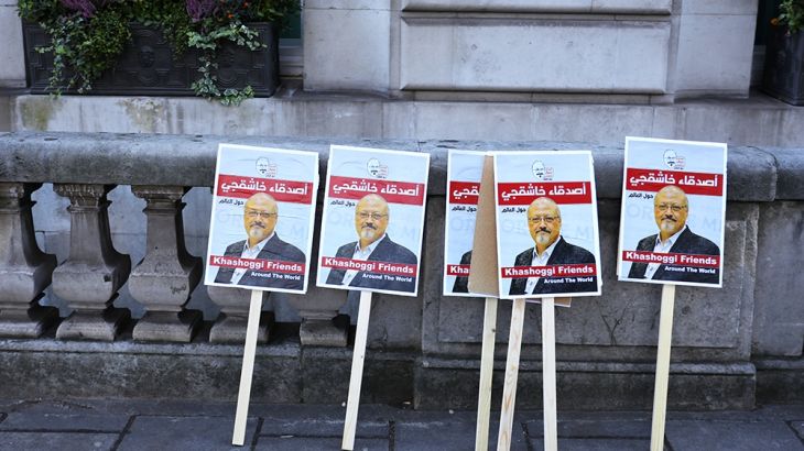 Placards can be seen outside the embassy as people protest against the killing of journalist Jamal Khashoggi in Turkey outside the Saudi Arabian Embassy in London, Britain, October 26 2018. REUTERS/Si