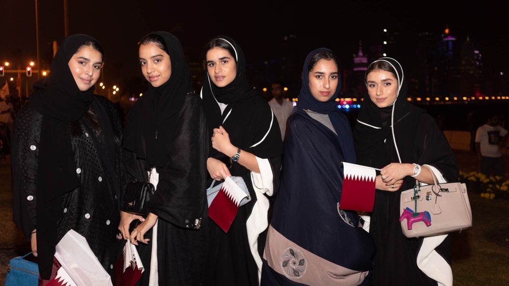 The al-Jeda teenagers said the happiness of people in Doha tonight cannot be contained [Sorin Furcoi/Al Jazeera] 