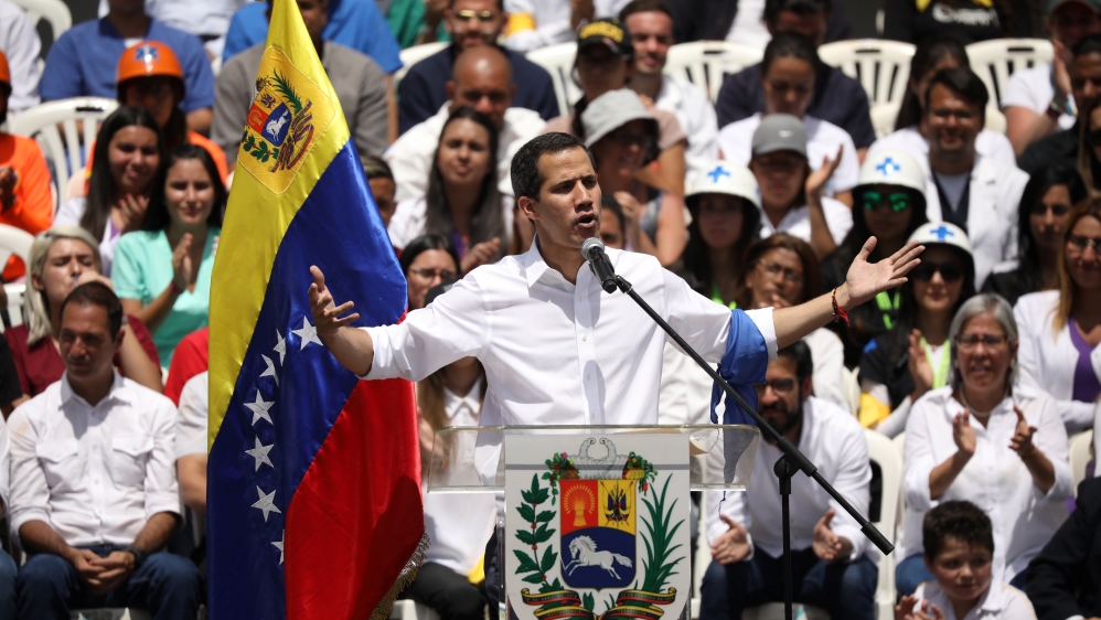 Venezuelan opposition leader Juan Guaido, speaks during a meeting with volunteers to coordinate humanitarian aid [Andres Martinez Casares/Reuters]
