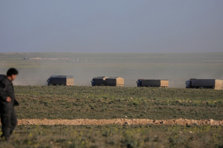 Trucks move near Baghouz