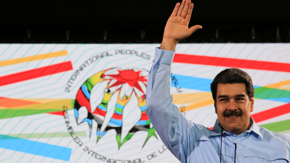 Venezuela's President Nicolas Maduro has denied there is a crisis despite overseeing a hyperinflationary economic meltdown [Miraflores/ Reuters]