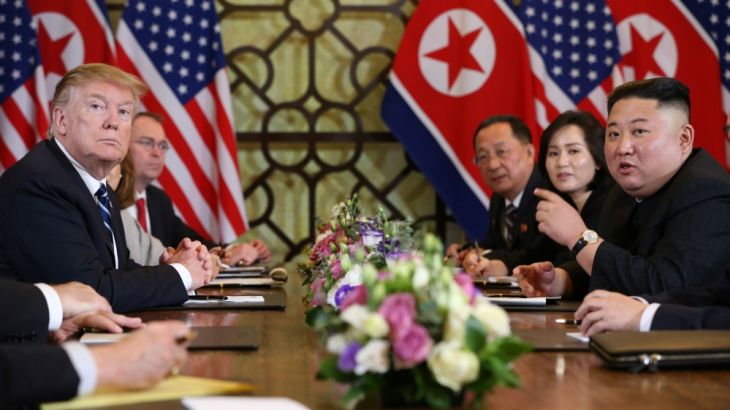 North Korea''s leader Kim Jong Un speaks as U.S. President Donald Trump looks on during the extended bilateral meeting in the Metropole hotel during the second North Korea-U.S. summit in Hanoi