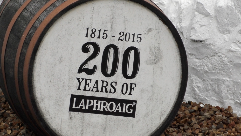 A whisky barrel advertising Laphroaig single malt peated Whisky from Islay [Alasdair Soussi/Al Jazeera]