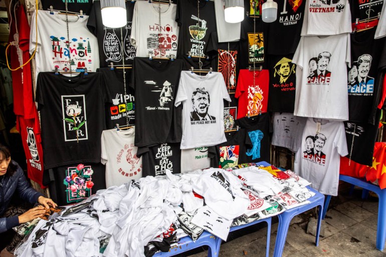 Trump-Kim mania hit the streets of Hanoi early, with shopkeepers cashing in by selling souvenirs, including various types of tshirts bearing the two leaders’ faces and the countries’ flags. [Faras Gha