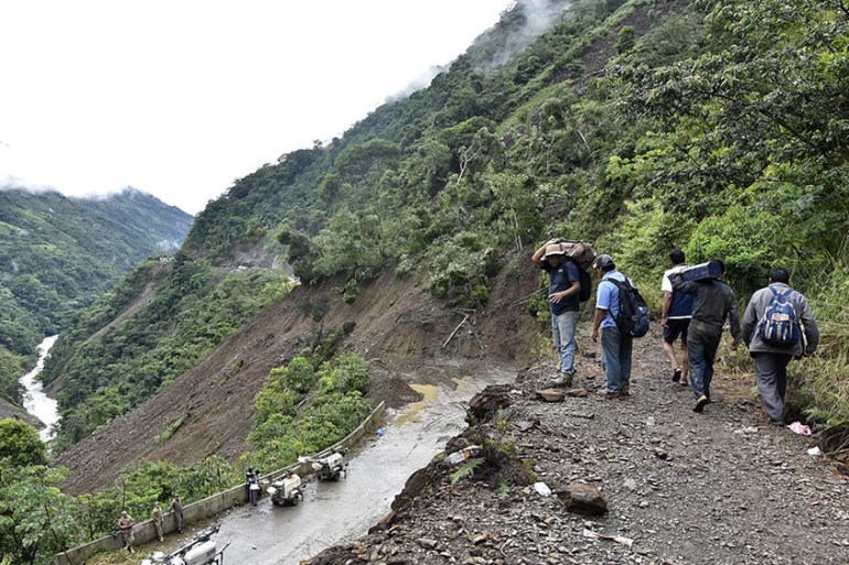 At least 14 dead in Bolivia landslides