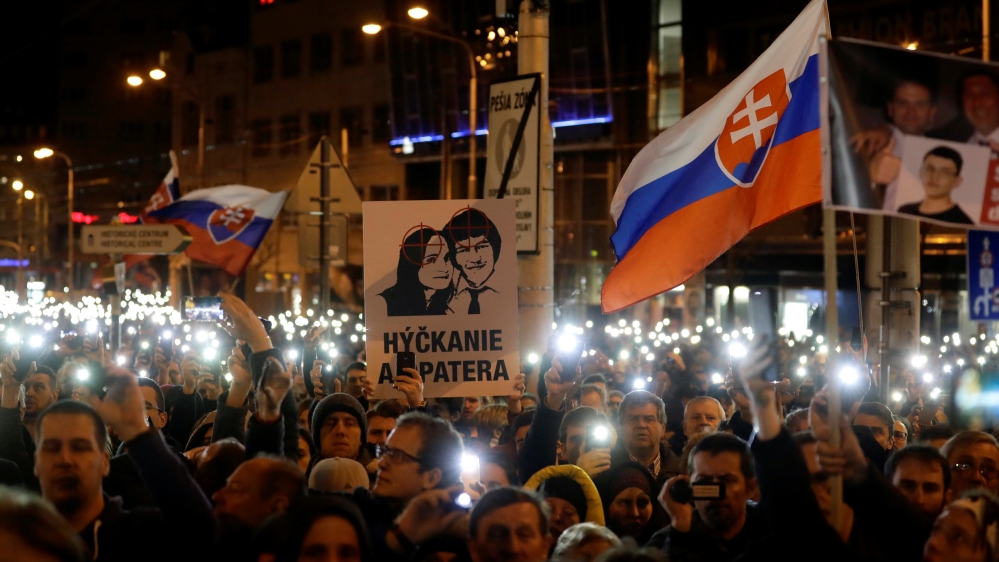 Demonstrators take part in a protest rally marking the first anniversary of the murder of Kuciak and his fiancee in Bratislava [File: David W Cerny/Reuters]