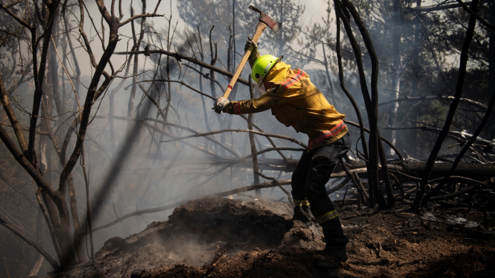 About 190 firefighters have been deployed to battle the fire [Chad Sharman/New Zealand Defence Force/Handout via Reuters]
