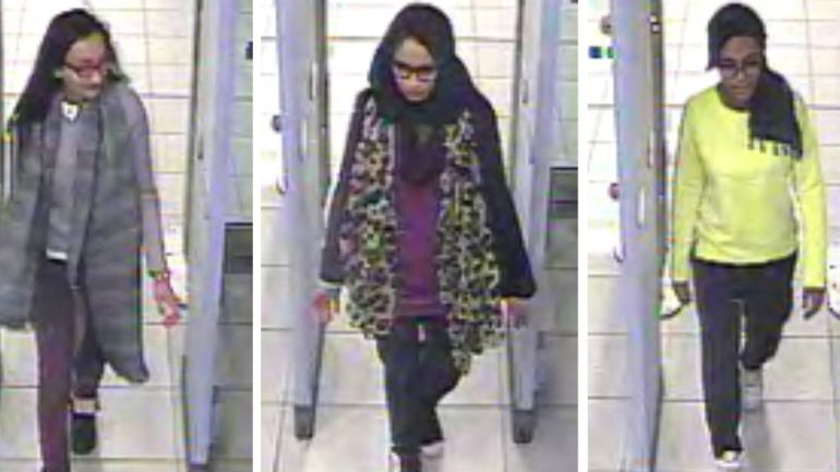 In this three image combo of stills taken from CCTV issued by the Metropolitan Police in London on Feb. 23, 2015, Kadiza Sultana, 16, left, Shamima Begum,15, center and 15-year-old Amira Abase going t