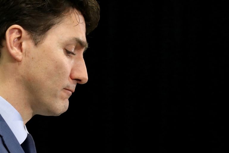 Canada''s PM Trudeau listens to a question during a news conference in Ottawa