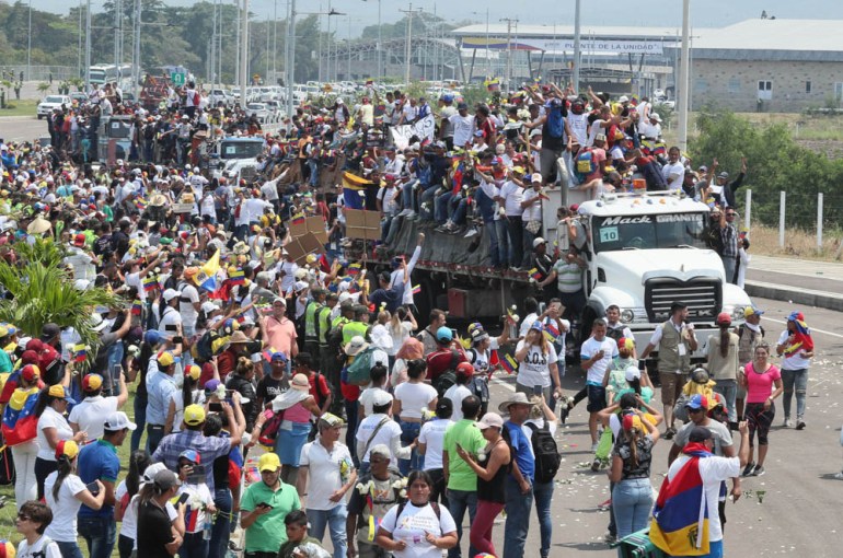 Venezuelan citizens riding in trucks, in Cucuta, Colombia, 23 February 2019. Hundreds of Venezuelans gathered today on the Colombian side of the Simon Bolivar international bridge that connects Cucuta