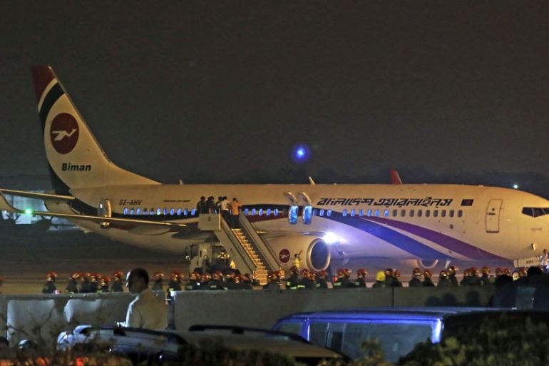 Bangladesh’s state-run Biman Bangladesh Airlines flight is seen after it made an emergency landing at the airport in Chittagong, Bangladesh, Sunday, Feb.24, 2019