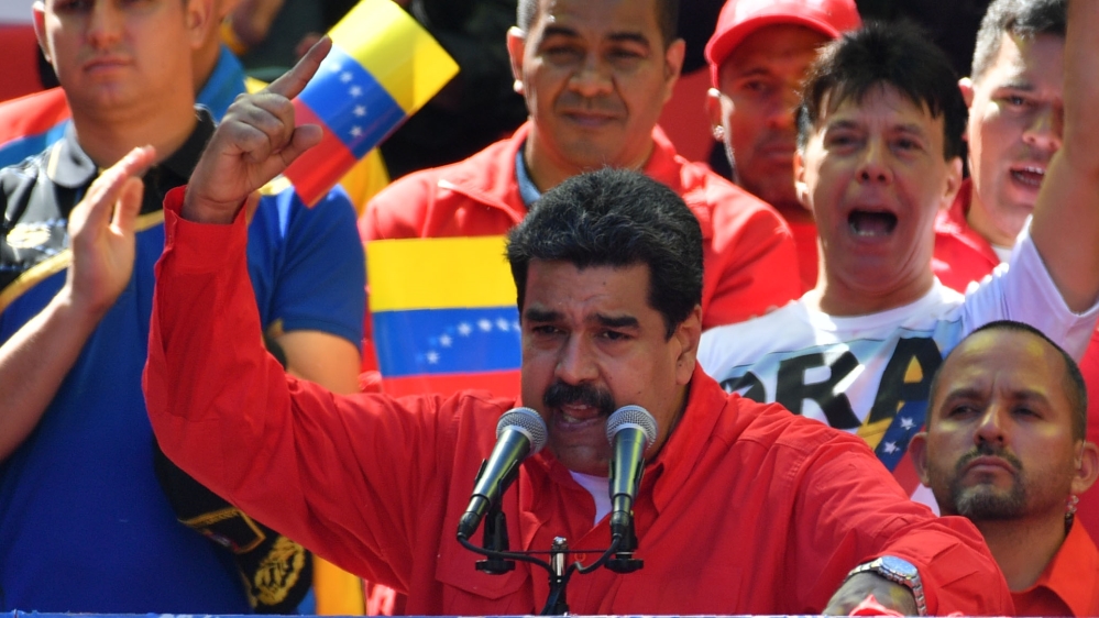 Venezuelan President Nicolas Maduro speaks during a pro-government march in Caracas [Yuri Cortzez/AFP] 