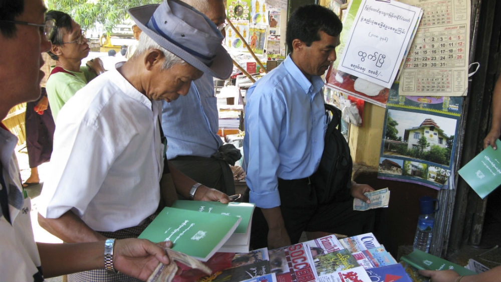 The military-written charter on sale at a stall in Yangon in April 2008 [File: Aung Hla Tun/Reuters]