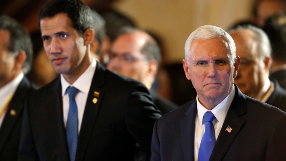 US Vice President Mike Pence and Venezuelan opposition leader Juan Guaido attend a meeting of the Lima Group in Bogota [Luisa Gonzalez/Reuters]