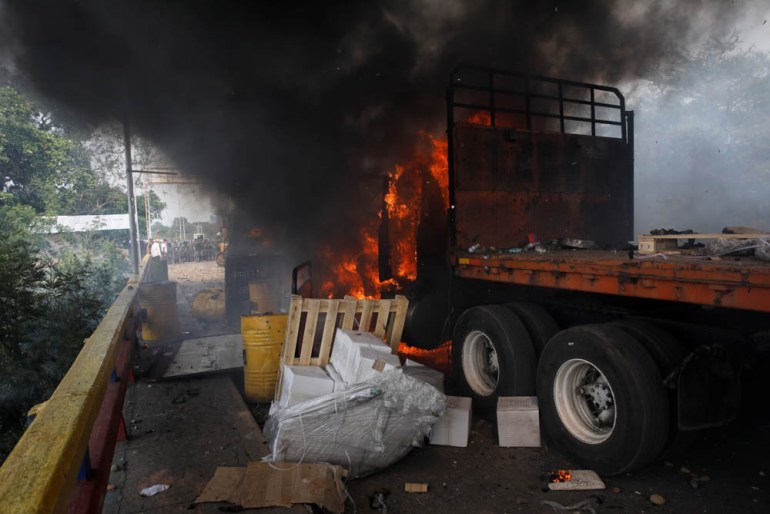 A truck that was carrying humanitarian aid for Venezuela is seen on fire after clashes between opposition supporters and Venezuela''s security forces at Francisco de Paula Santander bridge on the borde