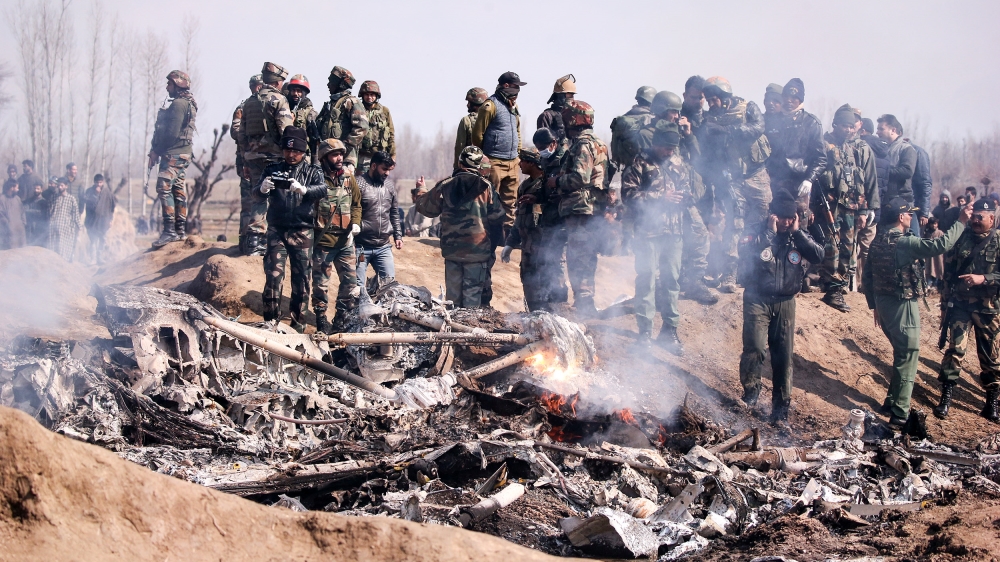 Indian officials said that two pilots and a civilian had died after an air force plane crashed in Indian-administered Kashmir [Danish Ismail/Reuters] 