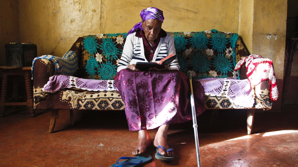 Grace Mbithe, a widow of a British army veteran living in the highlands near Nairobi, still remembers how her husband was snatched from their village and sent off to North Africa [Jack Losh/Al Jazeera]